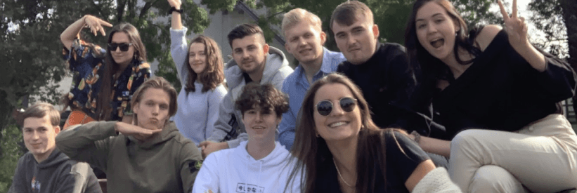 Group of friends outdoors on campus